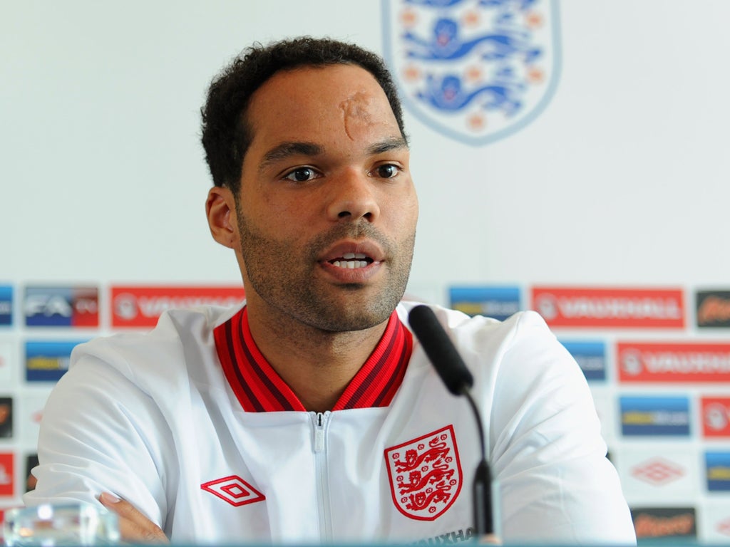 Joleon Lescott said his family might travel if England reached the final