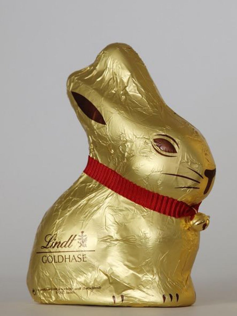 Swiss confectioner Lindt & Sprüngli has produced gold-foiled and
be-ribboned chocolate rabbits for the past 60 years