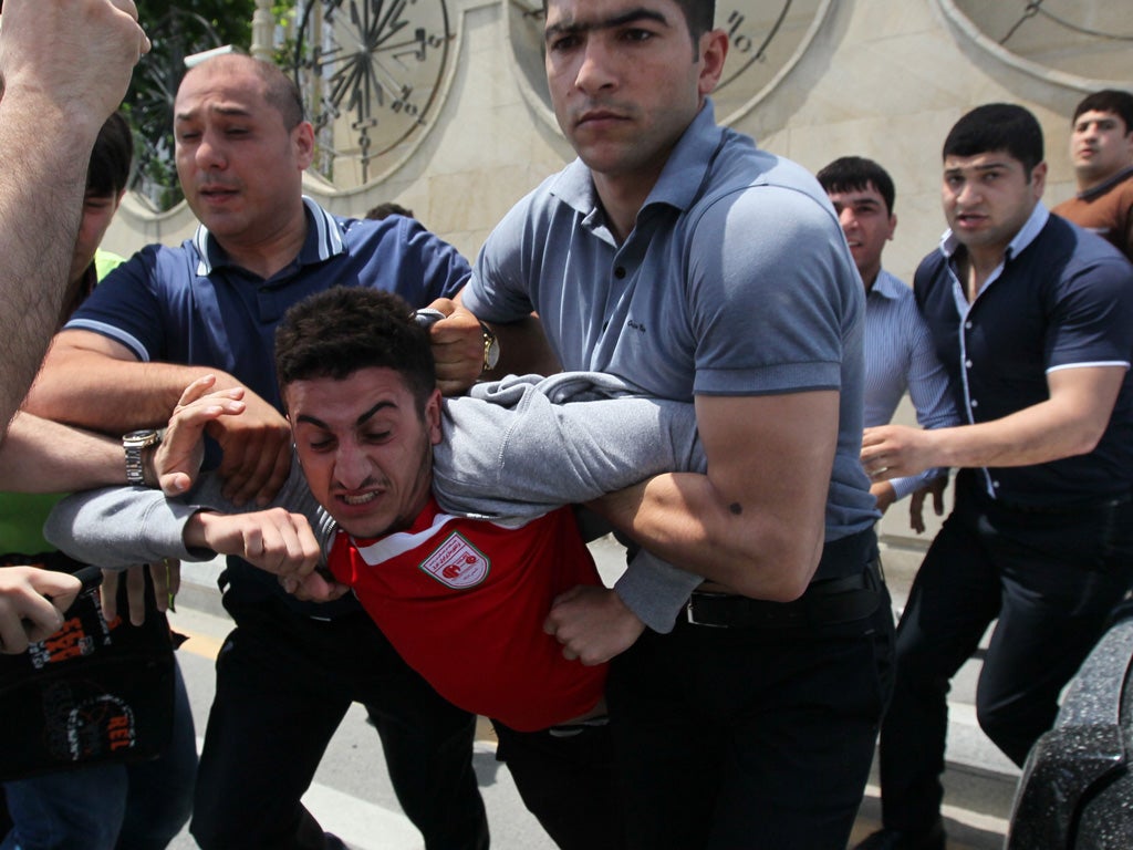 Police seize protesters in the capital, Baku