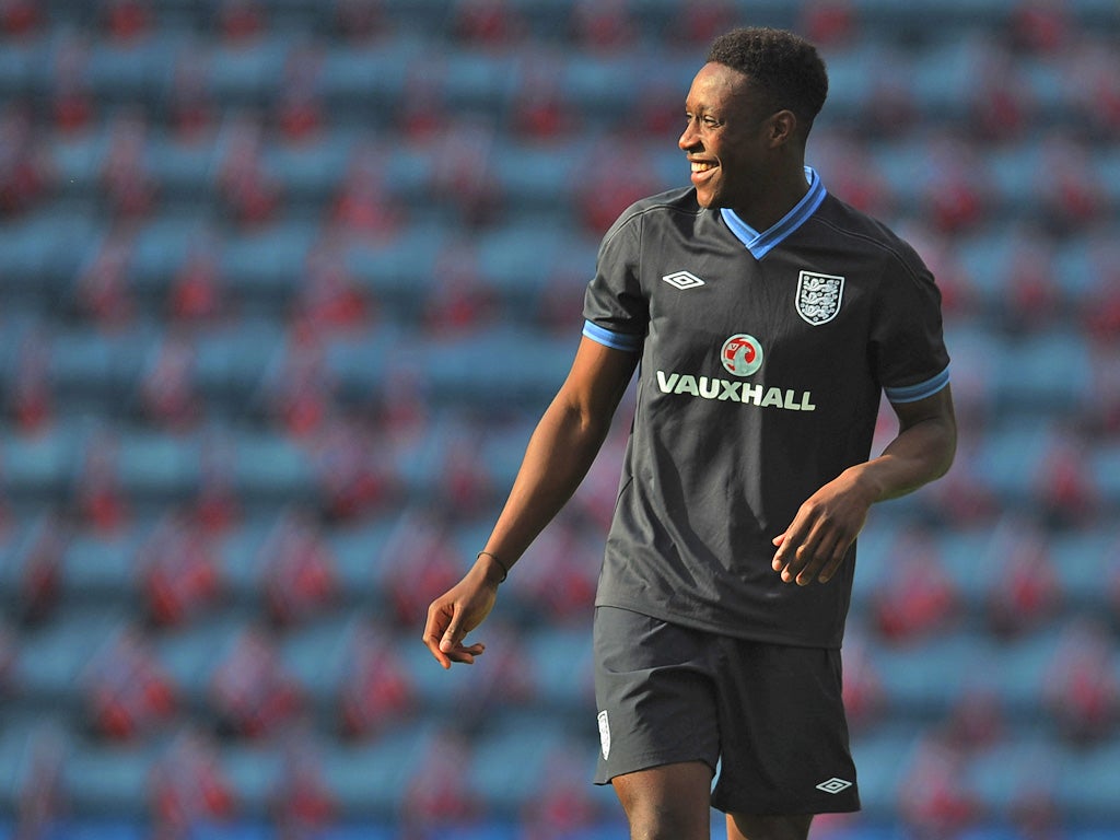 Danny Welbeck sees the funny side during training in Oslo but
concerns remain over his injury