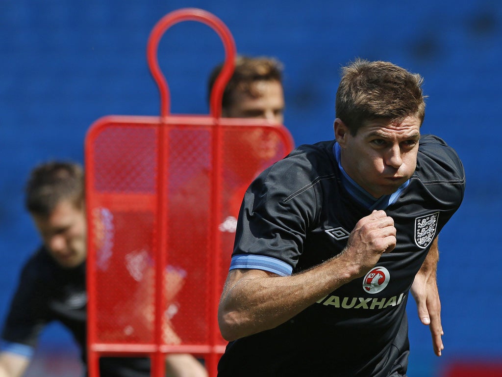 Steven Gerrard leads by example during training