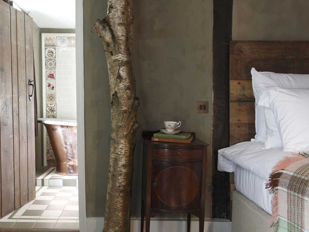 Original feature: Every room at The Bell in Ticehurst, has a silver birch tree trunk in it