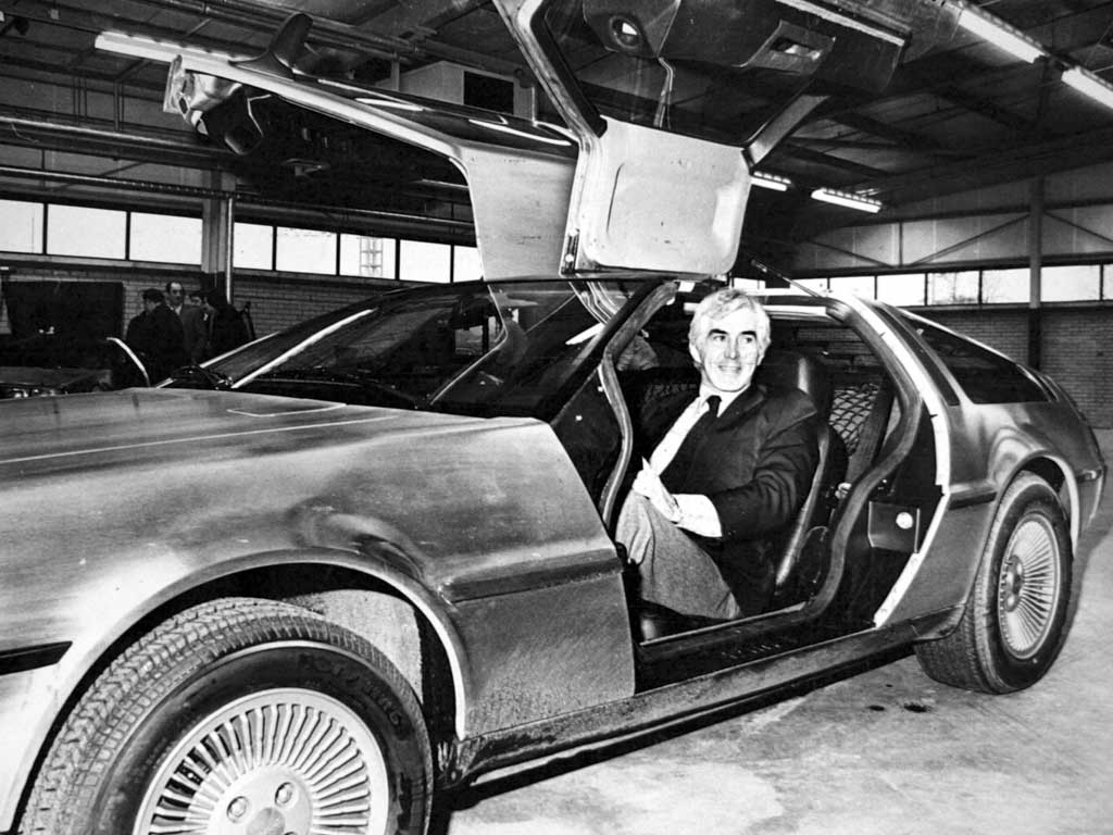 John DeLorean, pictured behind the wheel of his gull-winged sportscar in 1981
