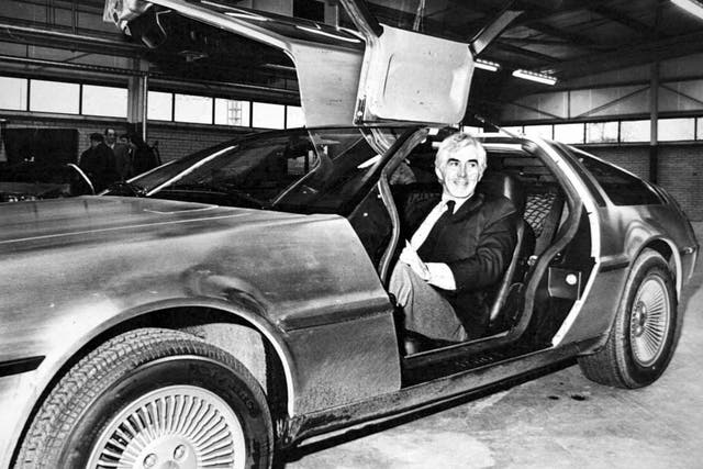 John DeLorean, pictured behind the wheel of his gull-winged sportscar in 1981