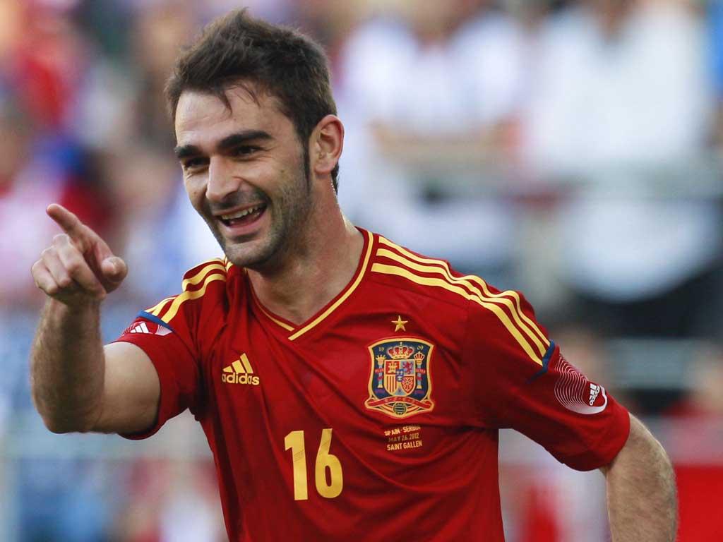 Pick me: Adrian Lopez celebrates after scoring in Spain's 2-0 win over Serbia