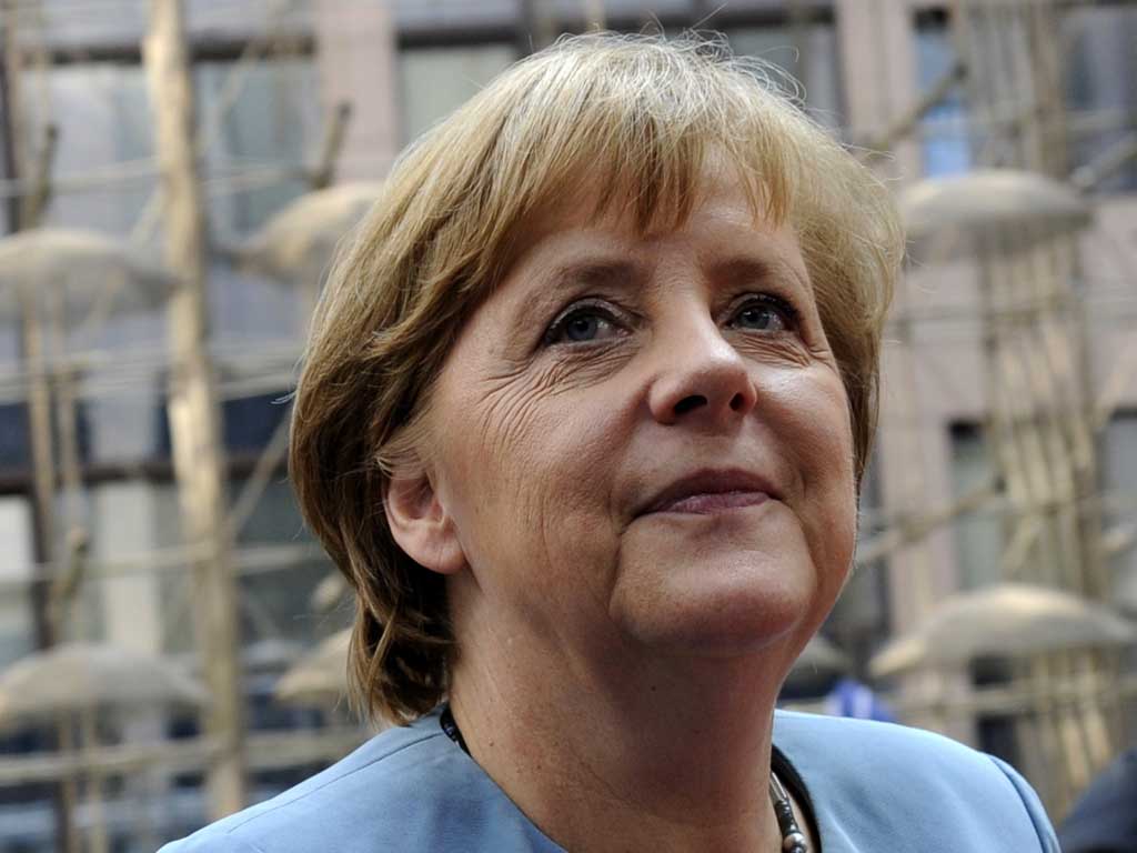 Angela Merkel insisted today that Europe's debt crisis can only be solved by keeping a tight rein on government finances