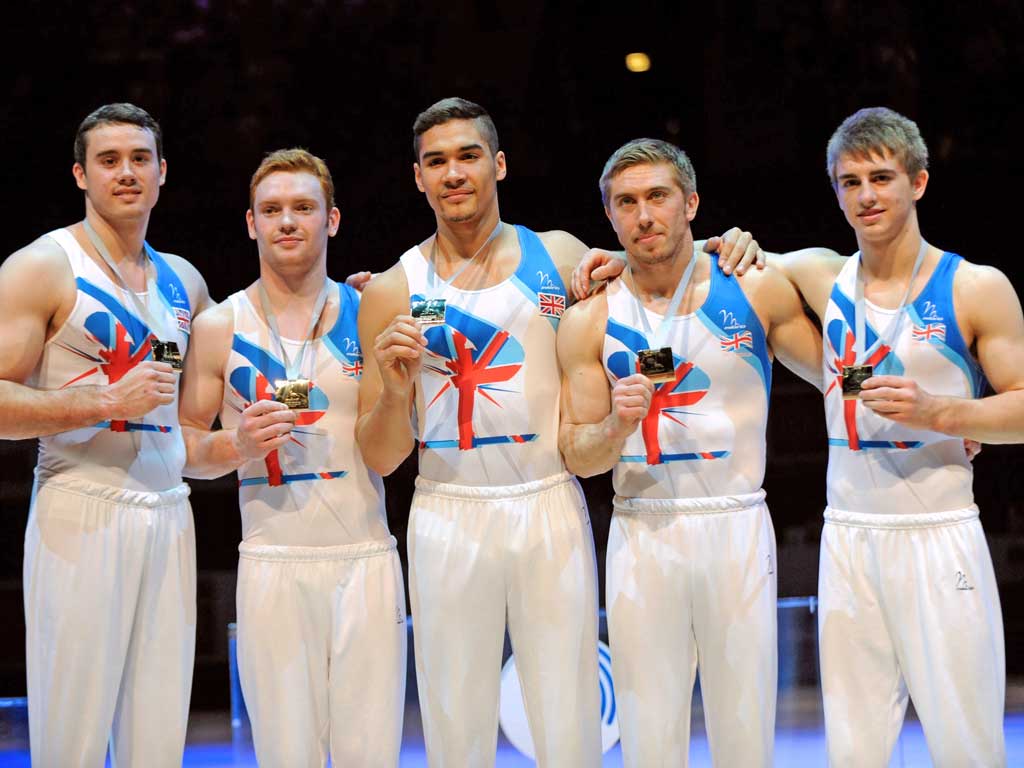 The British team with their gold medals during the award ceremony of the 30th European Men's Artistic Gymnastics Championships