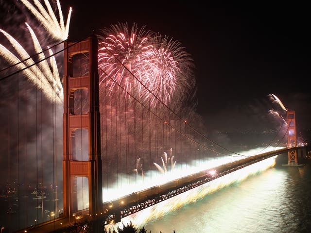 Fireworks explode over the Golden Gate Bridge on Sunday