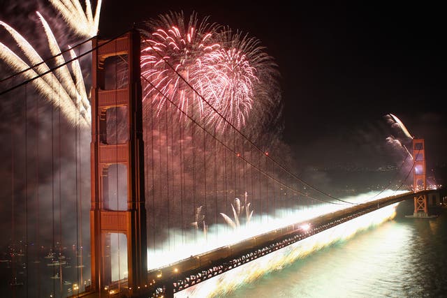 Fireworks explode over the Golden Gate Bridge on Sunday