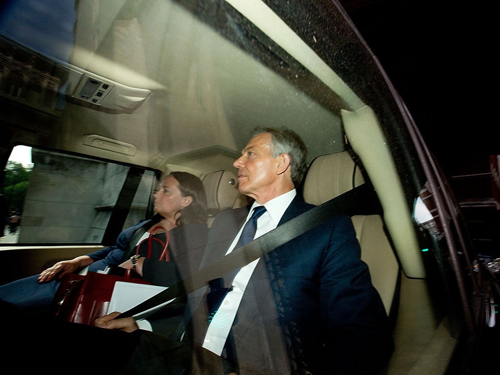 Tony Blair is driven away from the Leveson Inquiry last night