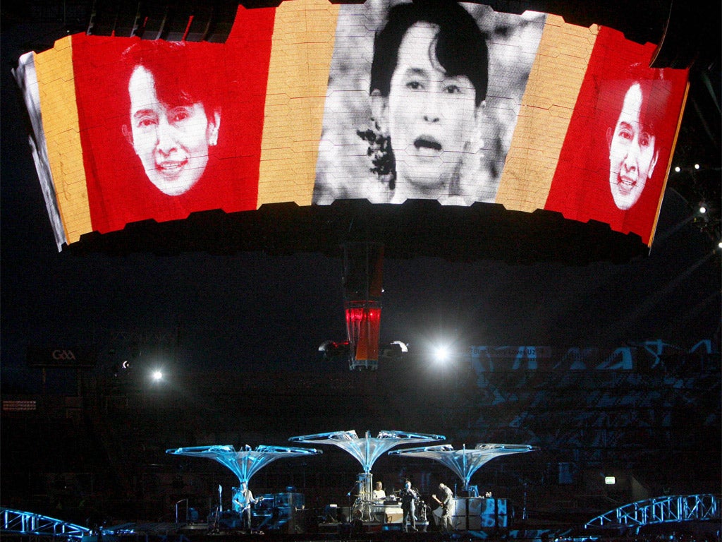 Portraits of a lay-dee: images of Aung San Suu Kyi on stage with U2 at a concert in Dublin in 2009