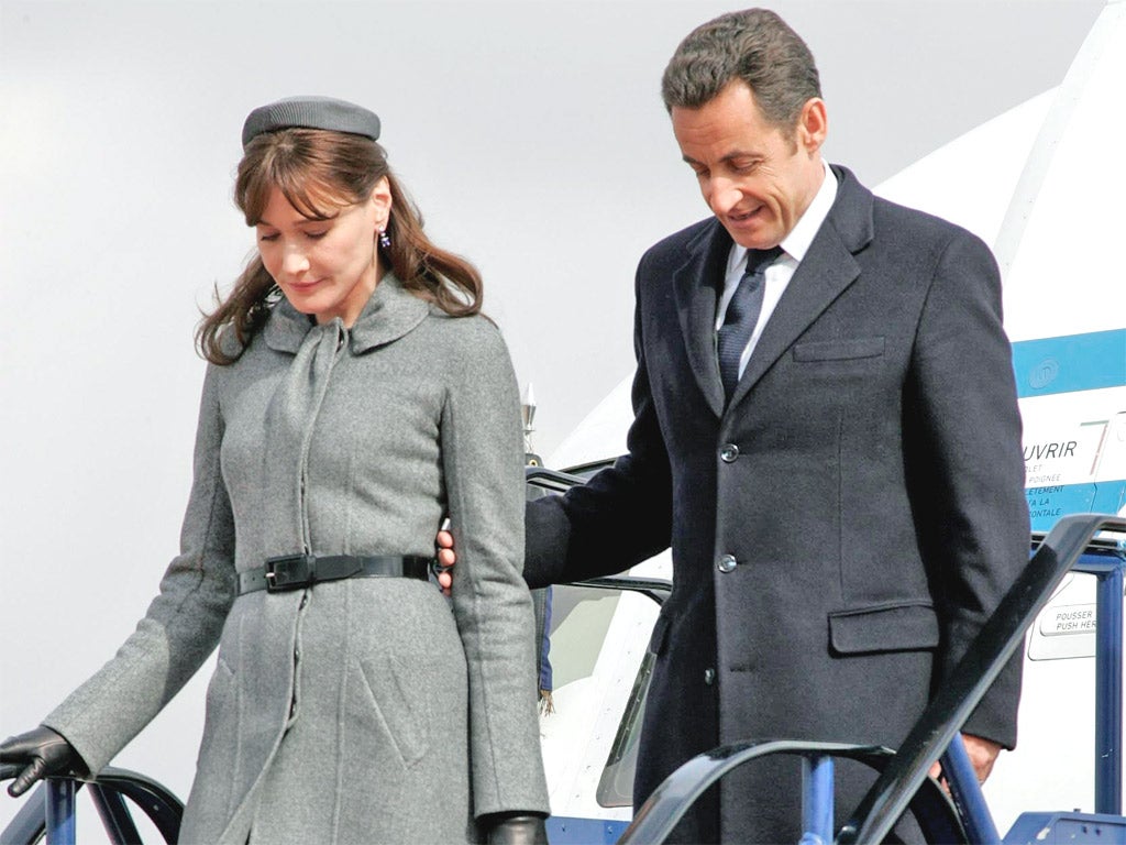 Nicolas Sarkozy, pictured with wife Carla Bruni, preferred to travel by plane