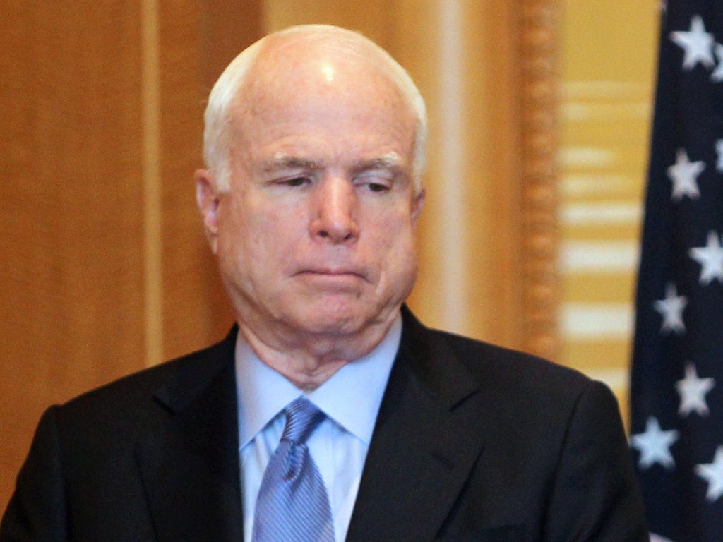 John McCain: The US senator said he was embarrassed that the US had 'refused to show leadership'