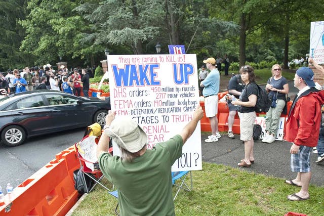 Protesters in Chantilly, Virginia, where the Bilderberg conference is taking place