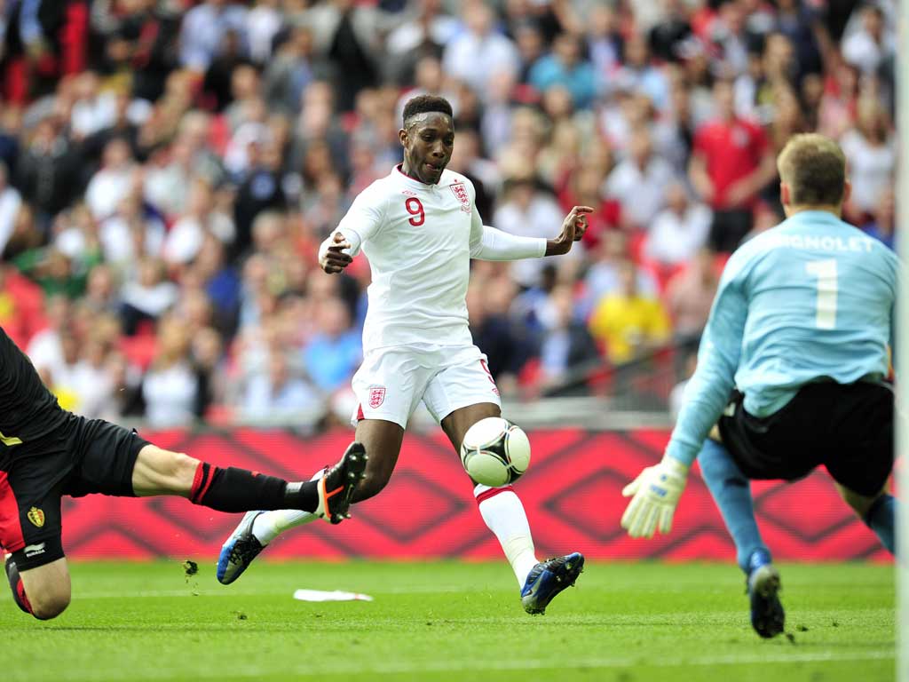 England's Danny Welbeck scores the first goal of the match