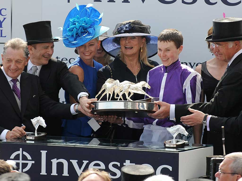 Son also rises: Joseph O'Brien, son of trainer Aidan, with the Derby trophy