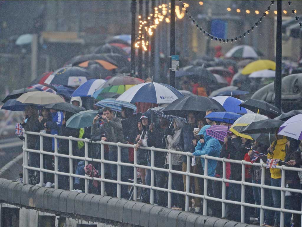 Persistent rain could not dampen the Jubilee spirit yesterday as more than one million people gathered in London to cheer on the 1,000-boat flotilla