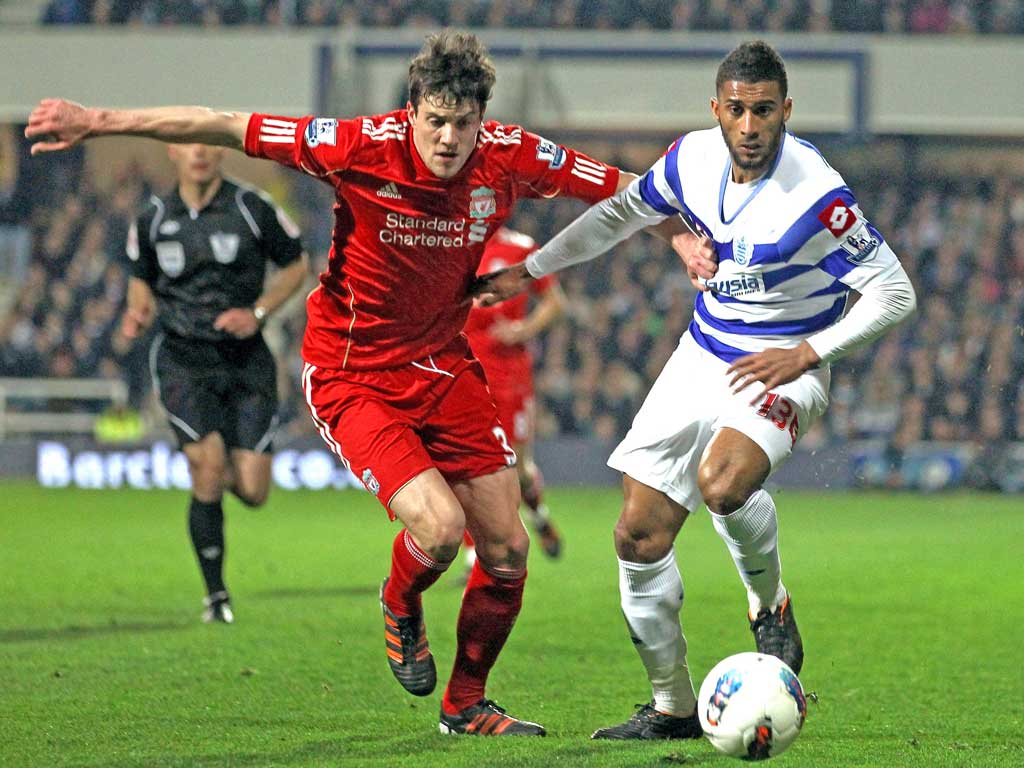 Martin Kelly (left) closes down QPR’s Armand Traoré in March