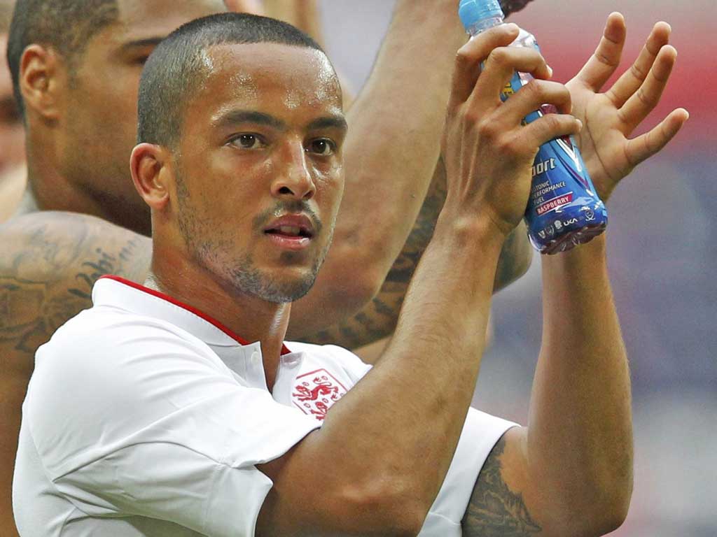 THEO WALCOTT: The Arsenal winger believes England can
survive without Wayne Rooney