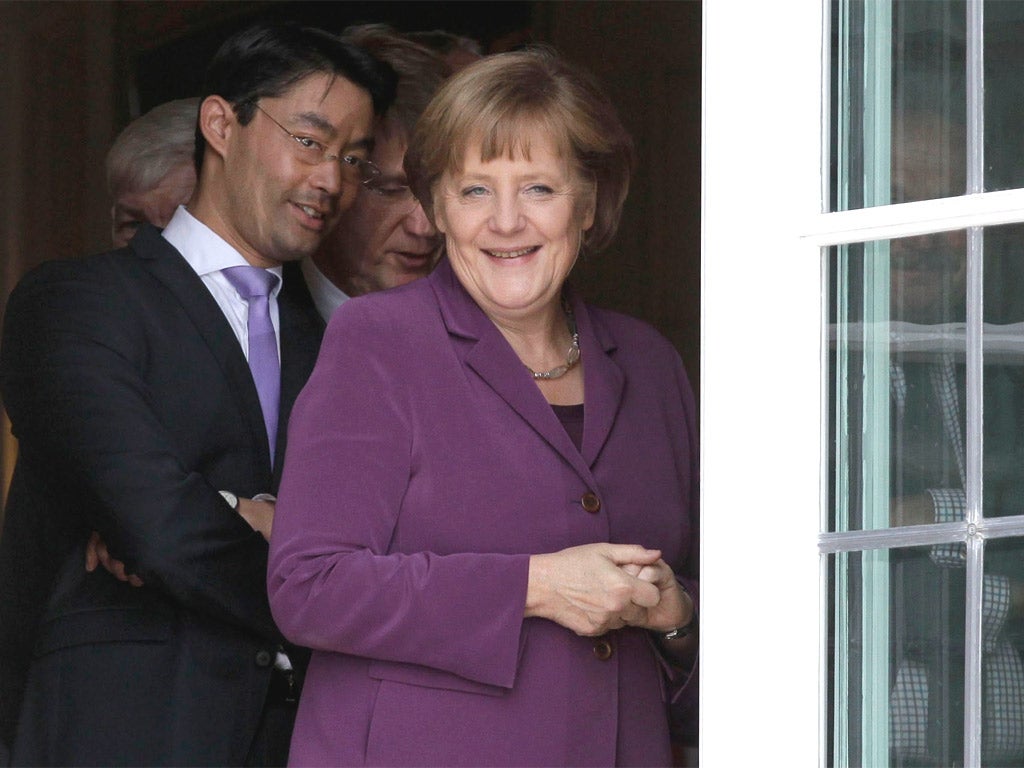 Angela Merkel meets her cabinet yesterday near Berlin, after proposing tighter fiscal union in the eurozone