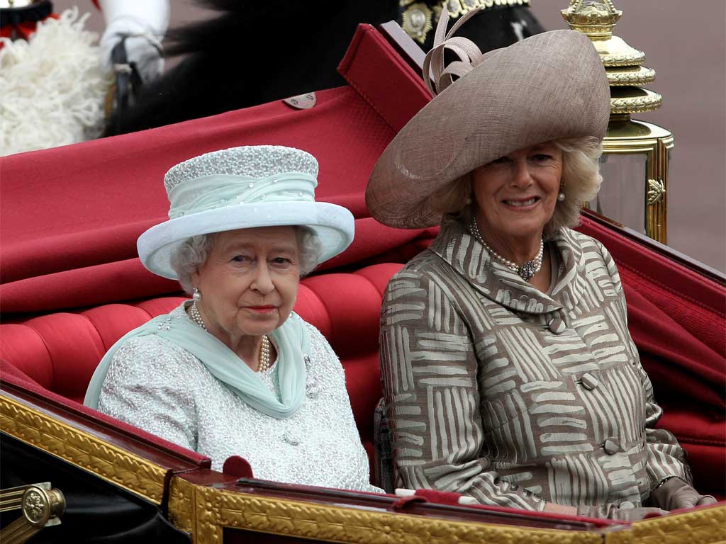 The Queen shares a carriage with the Duchess of Cornwall during the procession