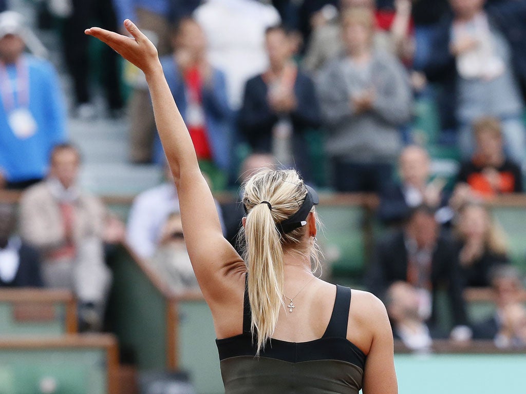 Maria Sharapova acknowledges the French crowd