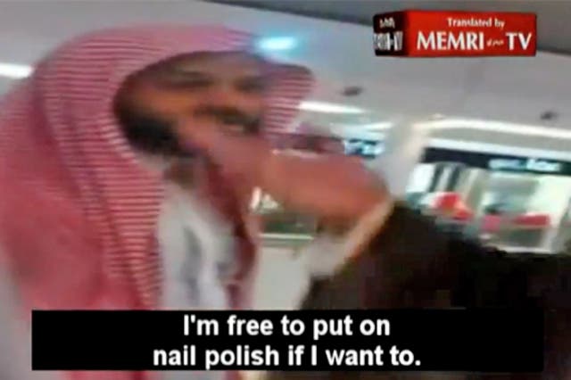 The woman defies members of Saudi Arabia's religious police