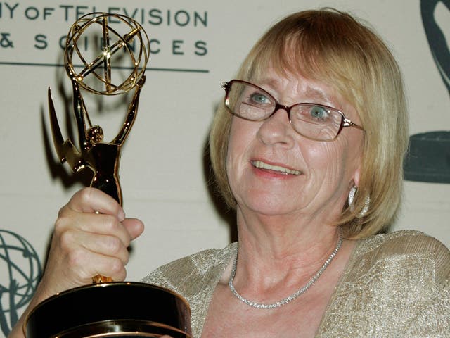 Brought humanity to a nosy, meddlesome character: Joosten with her Best Guest Actress Emmy in 2005