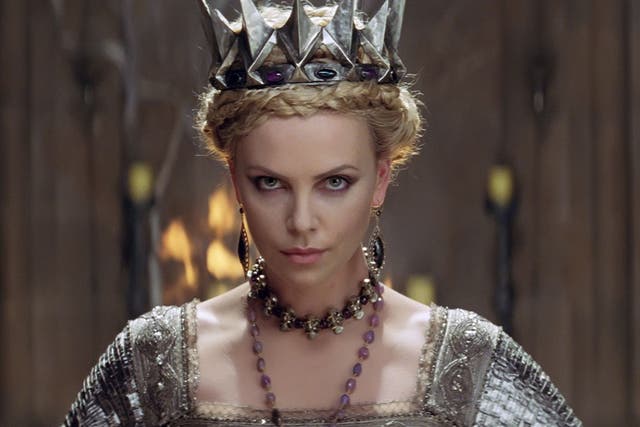 Charlize Theron (pictured) competes as queen with a surly action-adventurer Kristen Stewart in Snow White and the Huntsman
