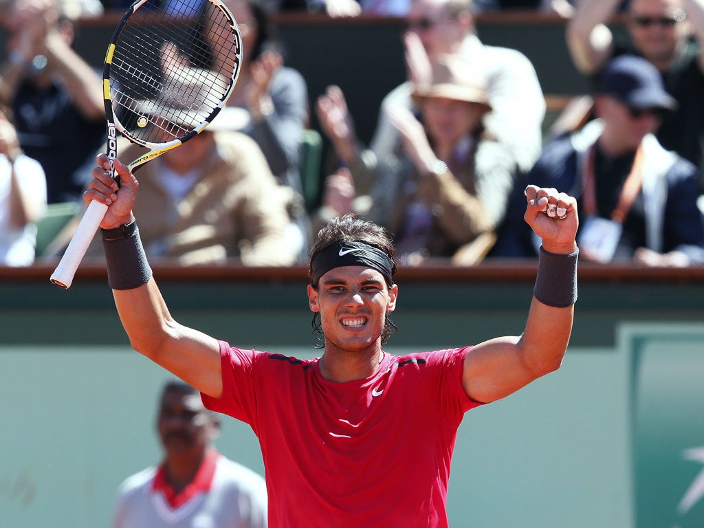 Rafael Nadal celebrates reaching the French Open final