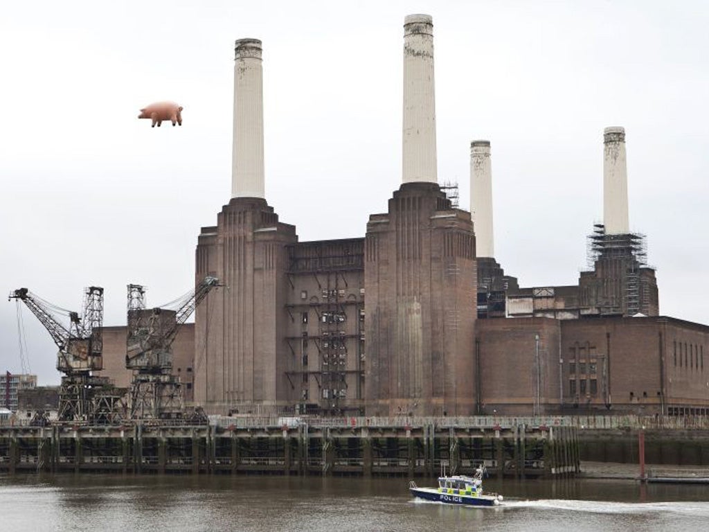 Towering ambition: the only pig spotted flying over the Battersea Power Station was this giant inflatable one re-creating Pink Floyd's cover of their 1977’s album Animals