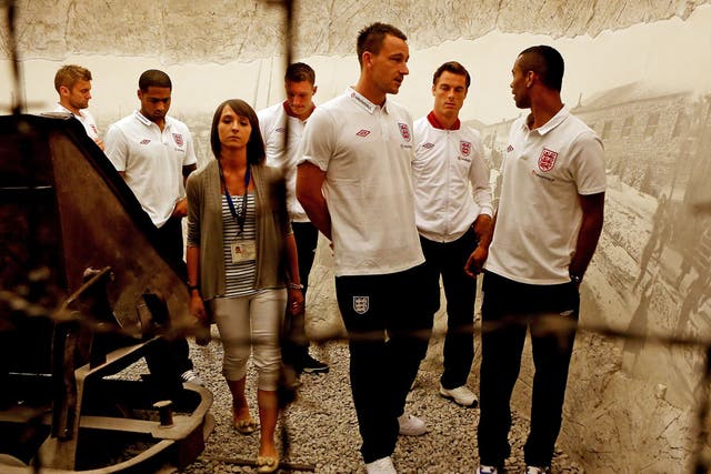 John Terry, Scott Parker and Ashley Cole during a visit by an England Football Association delegation to the Schindler Factory