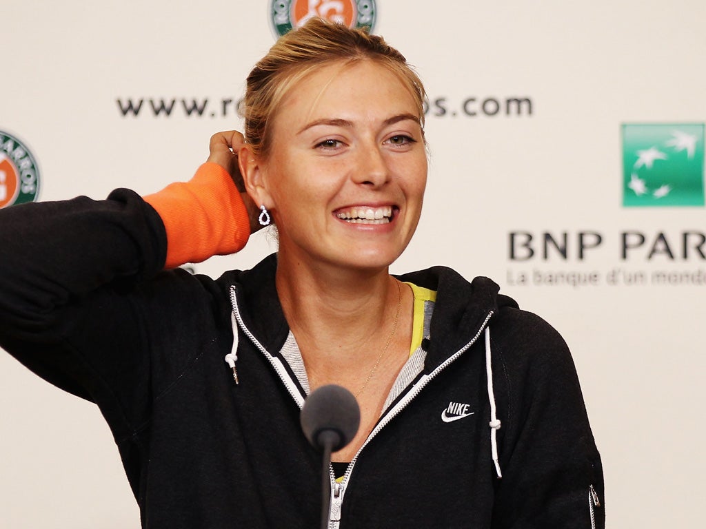 Maria Sharapova is all smiles after becoming world No 1 ahead of today’s women's final at Roland Garros