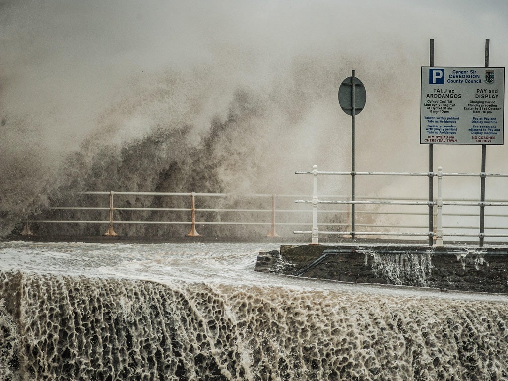 Raging seas lash the coast at Aberystwyth, west Wales