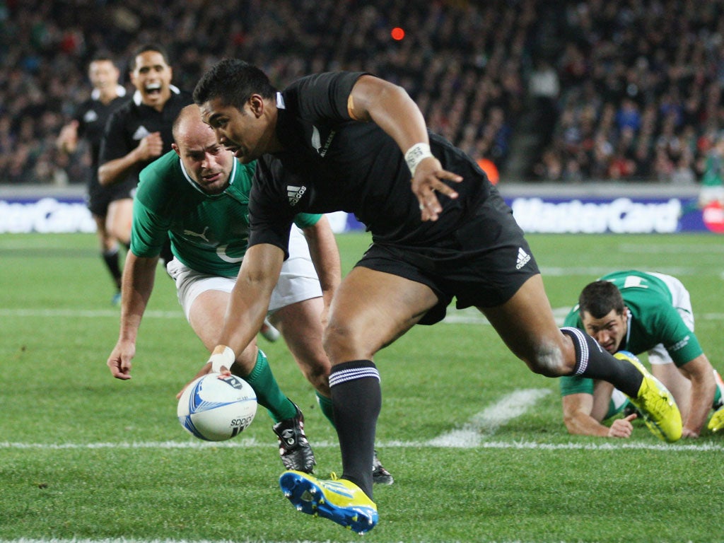 Julian Savea scores a try during the test at Eden Park