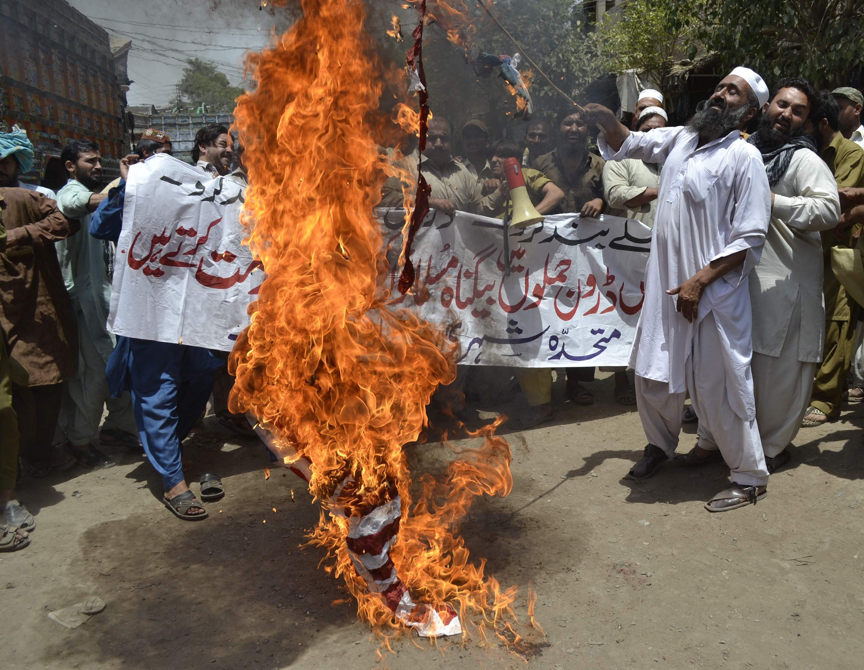 Activists in the Pakistani town of Multan protest against US drone attacks on a Taliban stronghold