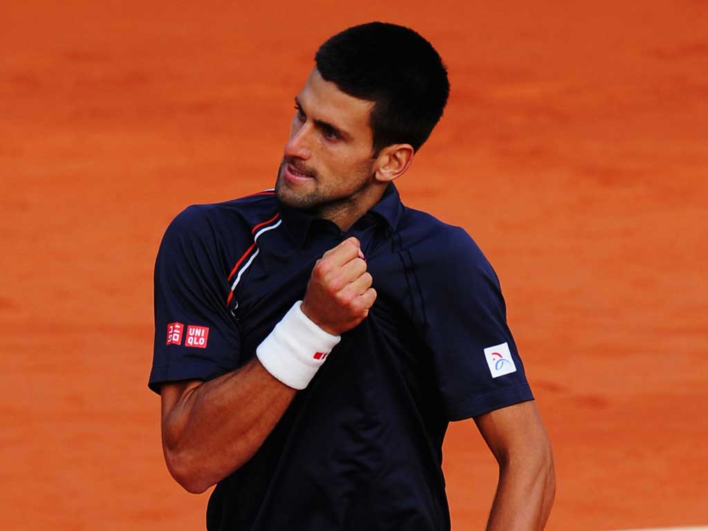 Heart and soul: Novak Djokovic is inspired by the chance to become the first man in 43 years to hold all four Grand Slam titles at the same time