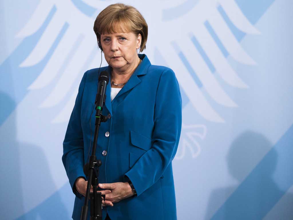 Angela Merkel is showing signs of a U-turn after refusing to help debt-laden Spanish and Greek banks