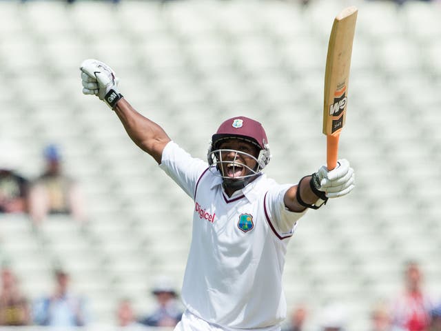 Tino Best celebrates becoming the first number 11 batsman to hit a half-century against England in over 100 years