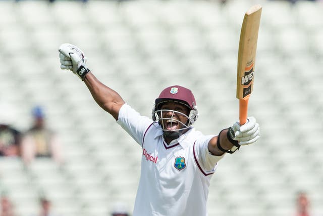 Tino Best celebrates becoming the first number 11 batsman to hit a half-century against England in over 100 years