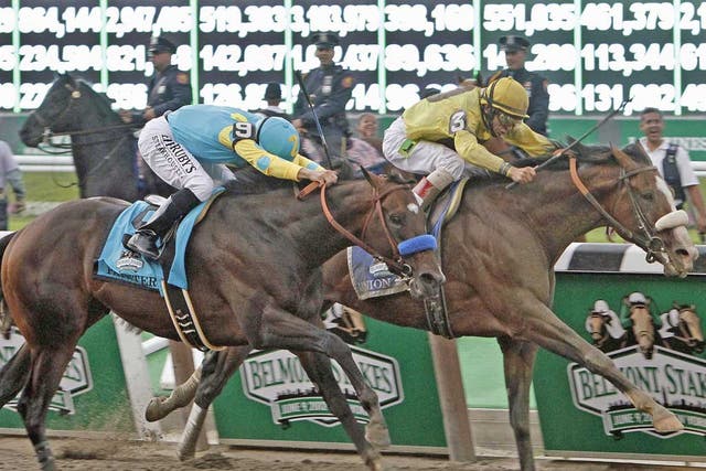 John Velazquez drives Union Rags (right) past Mike Smith on Paynter to win the Belmont Stakes