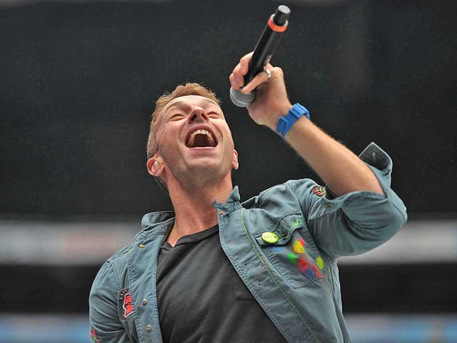 Singer Chris Martin and the rest of the group are cashing in on
the wristbands