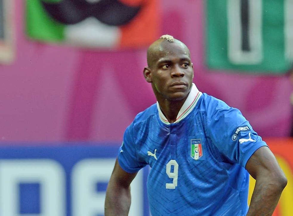 MARIO BALOTELLI: The Italy striker threatened to walk off the
pitch if subjected to racist abuse during games