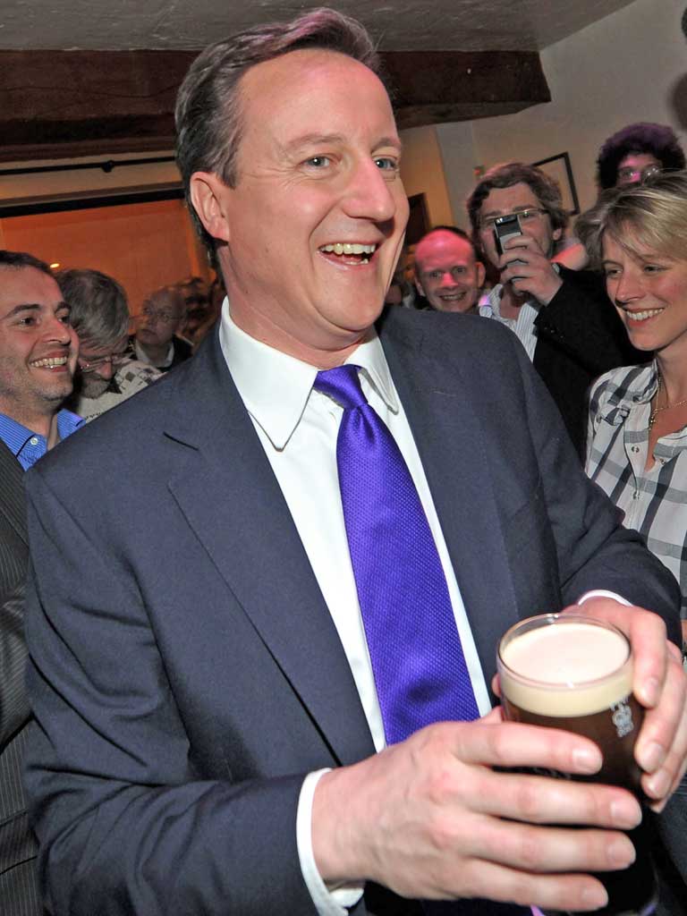 David Cameron goes for a pint at his local, where he left his eight-year-old daughter