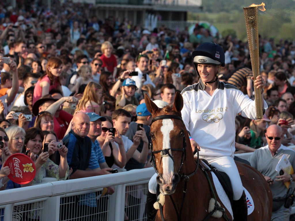 Zara Phillips with the Olympic torch