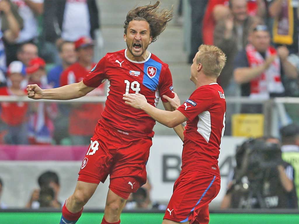 Czech midfielder Petr Jiracek (left) celebrates scoring the first goal