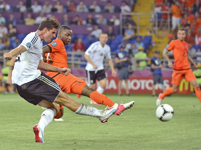 Germany's Mario Gomez scores his - and his side's - second goal 