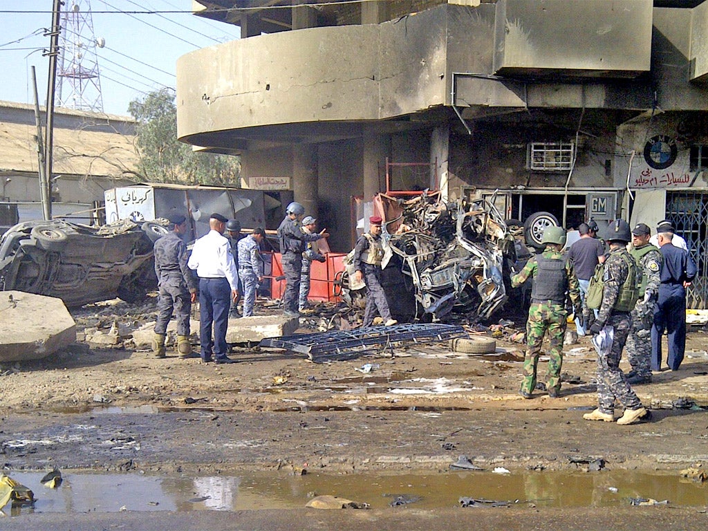 The site of a car bomb attack which killed Shia pilgrims travelling to a religious festival in Baghdad