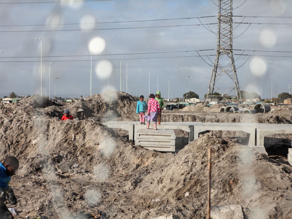 Children playing in the Langa township, a location in the movie
