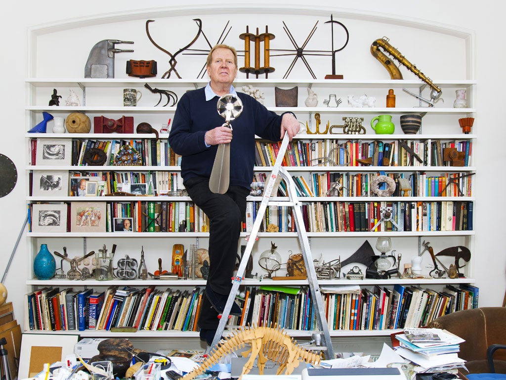 Can you tell what it is yet? Usborne holding his prized anemometer - a wind-speed measurement device more often employed by those at sea; second shelf down, fourth from left, the claw-like carding tool, used to detangle wool